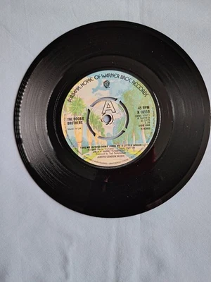 THE DOOBIE BROTHERS "TAKE ME IN YOUR ARMS" 1975 7" SINGLE IN A PLAIN SLEEVE - Image 1 of 4