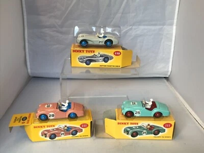 ATLAS DINKY A GROUP OF 3  110 ASTON MARTIN  & 111 TRIUMPH TR2 (2). NICE SET BNIB - Image 1 of 4