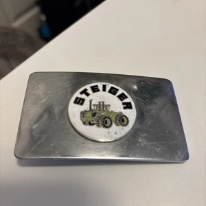 DE COLECCIÓN AÑOS 70 **STEIGER** TRACTOR EMPRESA DE EQUIPOS AGRÍCOLAS HEBILLA DE CINTURÓN PLATEADA - Imagen 1 de 14