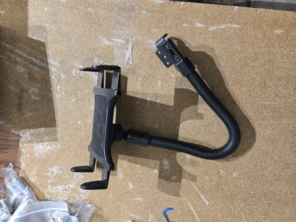 Universal Tablet Car Holder, designed for mounting in vehicles via the sit rail. - Image 1 of 4