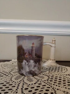 2003 Thomas Kinkade Conquering the Storms Porcelain Mug with Lighthouse Handle - Picture 1 of 6
