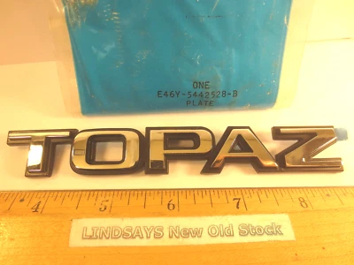 FORD 1984 MERCURY "TOPAZ" PLATE NAME LUGGAGE COMPARTMENT LID NOS VERY RARE - Изображение 1 из 3