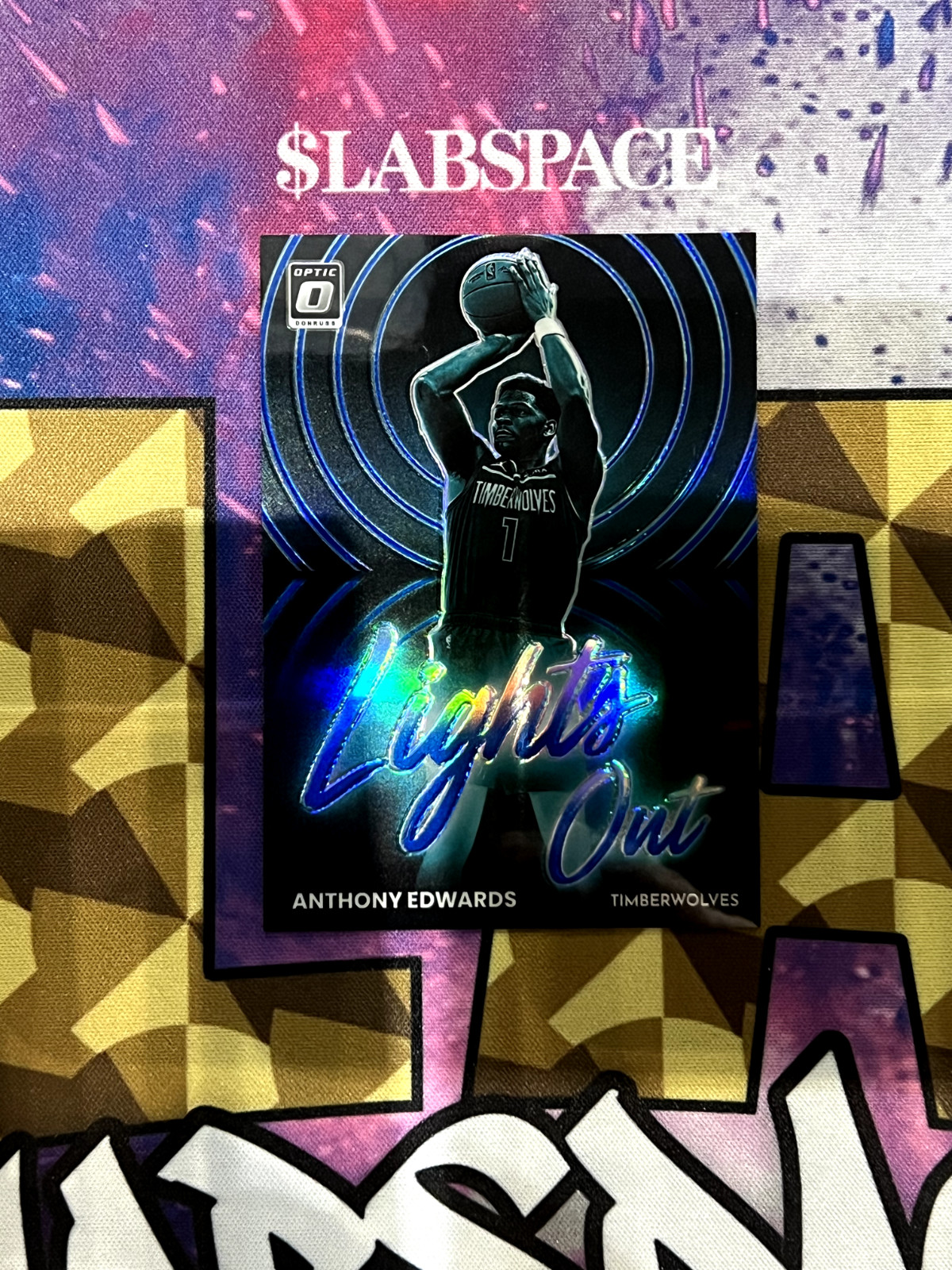 2022-23 Panini Donruss Optic Lights Out Blue Prizm 27/49 Anthony Edwards