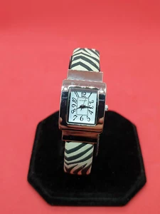 ladies gossip silver tone bangle watch,white face & black & white strap.#ba. - Picture 1 of 7