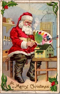 MERRY CHRISTMAS Santa Painting Toys embossed Postcard - Picture 1 of 2