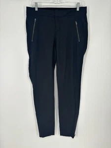 Athleta Wander Skinny Hose Nylon Stretch Reißverschlusstaschen aktiv einfarbig schwarz Gr. 10 - Bild 1 von 8