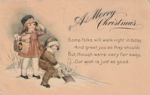 Christmas Postcard Children With Shovel And Gifts On Winter Scene c1910's - Picture 1 of 4