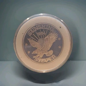 Moneda rara Sunshine Mining Eagle 1984 1/2 Troy OZ redonda de plata fina .999  - Imagen 1 de 2