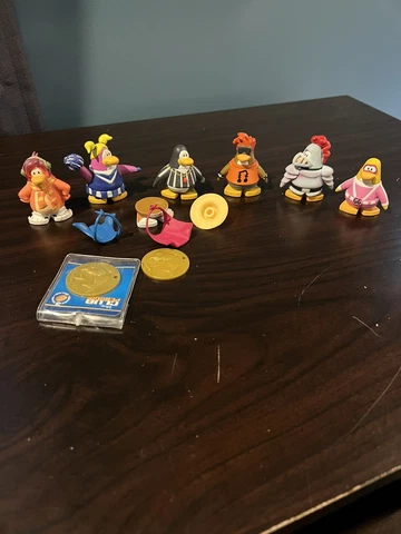 Disney club penguin action figures Cover