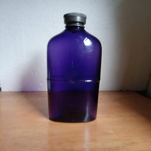OLRY & CO PHILADA FRASCO DE WHISKY DE BOLSILLO PÚRPURA ORIGINAL TAPA DE PELTRE CON FECHA DE 1866 - Imagen 1 de 7