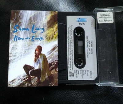 Shona Laing - New On Earth (Cass, Album) (Mint (M)) - 3869057368 - Image 1 of 3