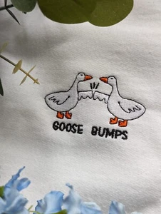 Goose-Bumps Embroidered Sweatshirt in White. Unisex - Picture 1 of 2