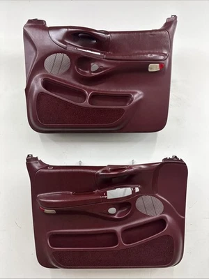 Par de paneles de puertas eléctricas Ford F-150 1997-1998 rojo/granate/borgoña OEM Foto 1 de 4