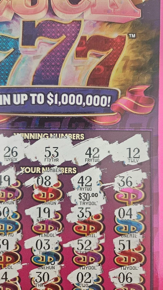 Boleto de lotería rascador ganador de Michigan Foto 1 de 2