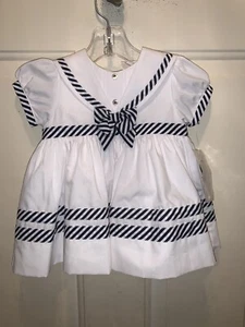 Sarah Louise Inglaterra. Bebé niña vestido blanco marinero con borde azul marino. Talla 3 meses Nuevo con etiquetas - Imagen 1 de 8