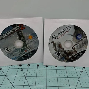 Sony Playstation 3 Game Lot - Assassin's Creed III & Uncharted 2 Among Thieves - Picture 1 of 3