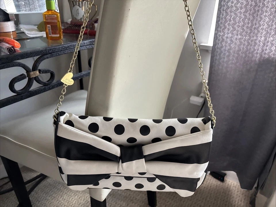 Betsey Johnson black and white polkadots and striped bow clutch - Image 1 of 3
