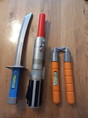 Teenage Mutant Ninja Turtles Katana Nunchuck And Star Wars Light Sabre Rare - Image 1 of 4