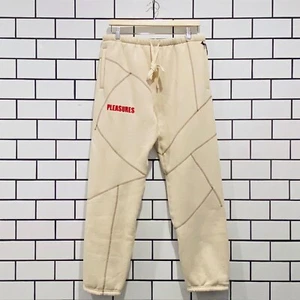 PANTALONES DE SUDADERA DE VENAS PLEASURES BRONCEADOS - Imagen 1 de 6