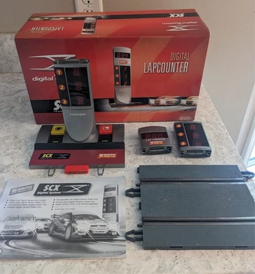 SCX 1:32 Digital System Slotcar Rundenzähler. Komplett und im Karton. - Bild 1 von 3