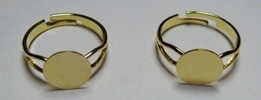 25 BLANCOS DE ANILLO AJUSTABLES CHAPADOS EN ORO con almohadilla plana redonda de 10 mm para cabinas + cuentas Foto 1 de 1