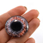 Paire d'yeux en verre fantastique rouge et noir 30 mm pour fabrication de bijoux ou de poupées