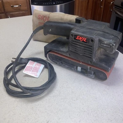 Lijadora de banda Skil 3” X 18” modelo 7313 con bolsa antipolvo probada y funcionando Foto 1 de 4