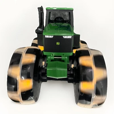 TOMY John Deere Monster Treads Lightning Wheels Tractor Green Lights - Image 1 of 4