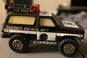 Matchbox Mega Blasters Cap Car Chevy K5 Blazer Sheriff Patrol Police Black - Picture 1 of 5