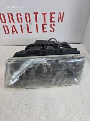 Faro lado del conductor Dodge Shadow Plymouth Sundance  Foto 1 de 4