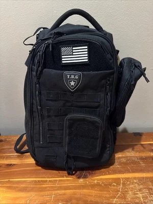 Mochila de día TBG Tactical Baby Gear negra bolsa de pañales mochila almohadilla cambiadora incorporada Foto 1 de 4