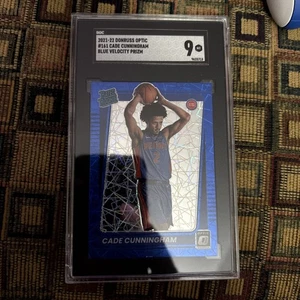 2021-22 Optic - Rated Rookie Cade Cunningham #161 Blue Velocity SGC 9 - Bild 1 von 2