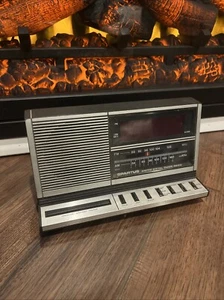 Vintage Spartus Alarm Clock Buzzer 0115-61 AM/FM Radio Wood Grain Tested - Picture 1 of 5