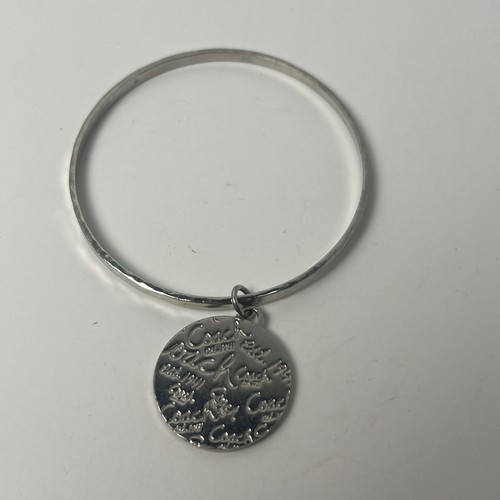 Bracciale Coach Charm con ciondolo cartellino da appendere tono argento