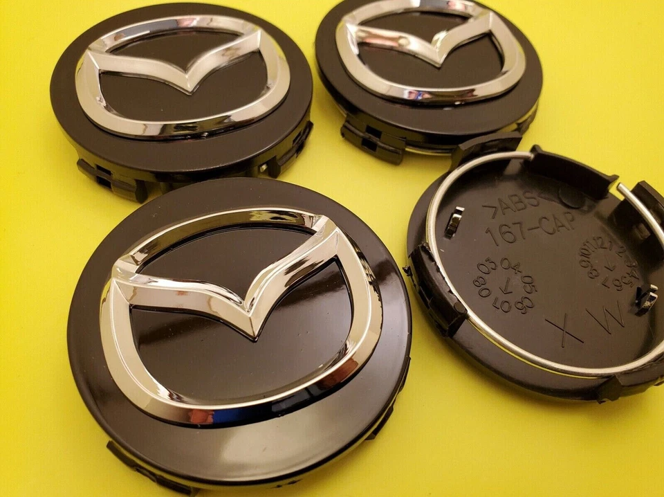 4 X MAZDA 56mm Black Wheel Center Caps - Mazda 3/5/6, Miata, RX 8, CX-3/5/7/9... - Image 1 of 3