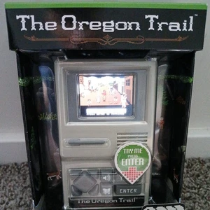 The Oregon Trail Electronic Handheld Retro Classic Computer Video Game Brand New - Picture 1 of 7