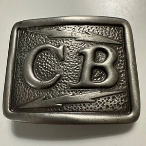 VTG Indiana Metal Craft X80 CB plus lingo 2.75 x 1.75” Silvertone Belt Buckle - Picture 1 of 6