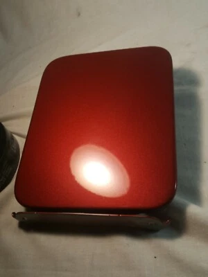 Nissan Versa SV 2013-2019 puerta de llenado de combustible Foto 1 de 4