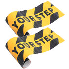Pair of Caution Signs: Watch Your Step & Wet Floor Warning