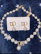 Rhinestone inlaid pearl necklace and earring set