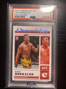 2023 Chronicles UFC Silver Holo /25 Caio Borralho PSA 10 - Foto 1 di 3