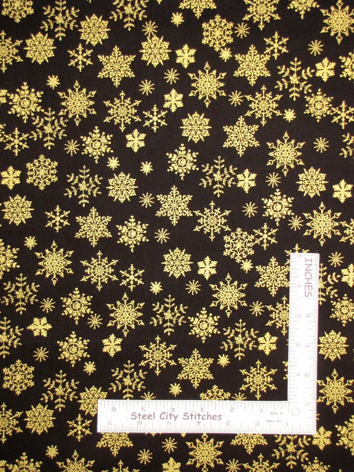 Copos de nieve metálicos dorados de Navidad sobre tela de algodón negro #49802M03 por yarda Foto 1 de 1