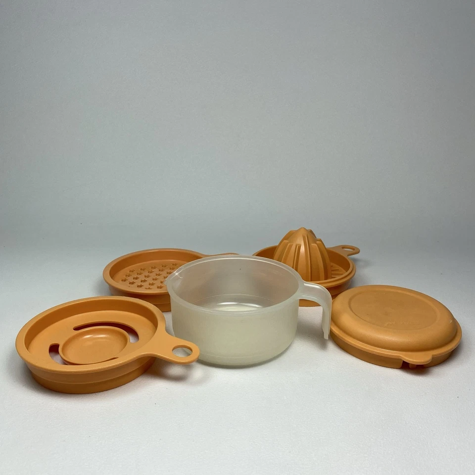 Tupperware Küchenperle orange Zitruspresse Reibe Eitrenner Deckel - Bild 1 von 3