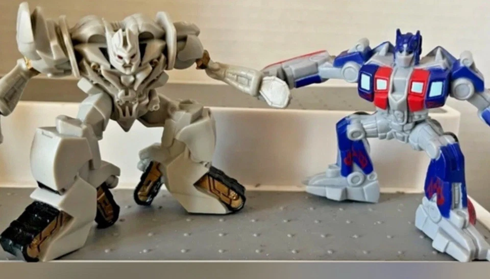 NEW Transformers Optimus Prime & Megatron Cake Toppers - Image 1 of 1