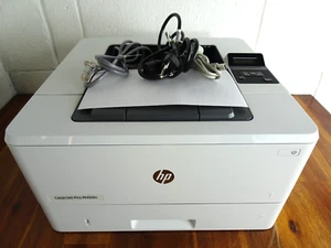 Imprimante laser monochrome HP LaserJet Pro M404n testée et fonctionnelle seulement 586 pages - Photo 1/6