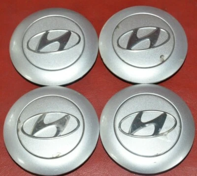 Tapacubos centrales Hyundai Entourage 2007-2010 52960-4D100 rueda OEM juego de 4 Foto 1 de 4