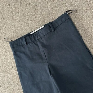 $638 Pantalones ajustados ROLAND MOURET US S 4 negros elásticos de algodón con cremallera lateral pierna dividida - Imagen 1 de 11