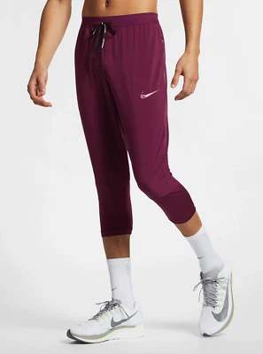 NEW MENS L LARGE NIKE WILD RUN RUNNING PANTS 3/4 CROP RED PURPLE AR4638 609 - Image 1 of 4