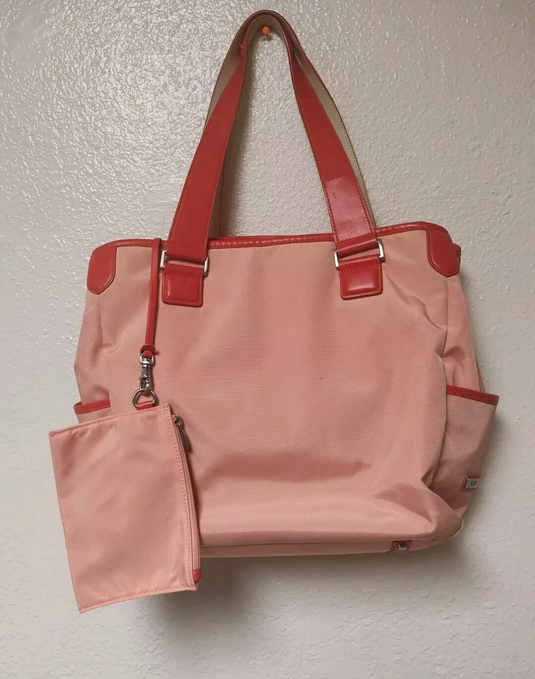Bolso de mano Tumi mediano para mujer   Foto 1 de 4
