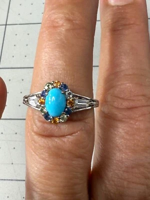 Anillo de plata de ley talla 7 con cabujón turquesa y halo de múltiples piedras preciosas Foto 1 de 4